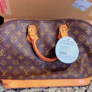 Louis Vuitton Monogram Alma PM with lock and keys